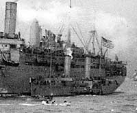 Photo # NH 53899-A: USS George Washington with USS Tudno alongside, December 1919