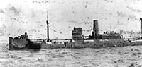 Photo # NH 94485:  S.S. Democracy at anchor, circa 1918.  Originally named Jupiter, she was later USS Democracy