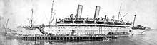 Photo # NH 98237: Panoramic photograph of USS America at Boston, Mass., 1917