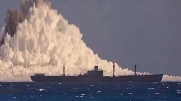 Ex SS Michael Moran (YAG-59) at 0.08 of a second after the underwater Umbrella test detonated at Eniwetok on 9 June 1958.